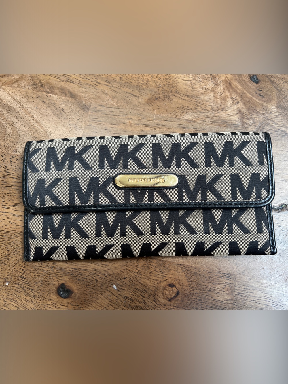 Michael Kors Black and Tan Logo Foldover Wallet with Gold Plaque